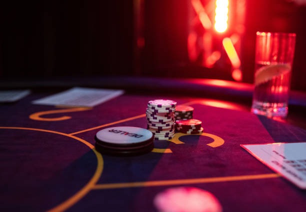 Sic Bo dice table layout with betting zones and payout odds displayed on screen